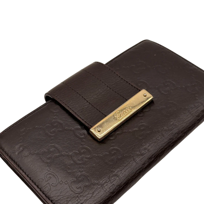 https://cdn.shopify.com/s/files/1/0564/9376/8855/files/Gucci_Geldbeutel_Bifold_langlich_aus_Leder_monogram_dunkelbraun_7.webp?v=1784242159