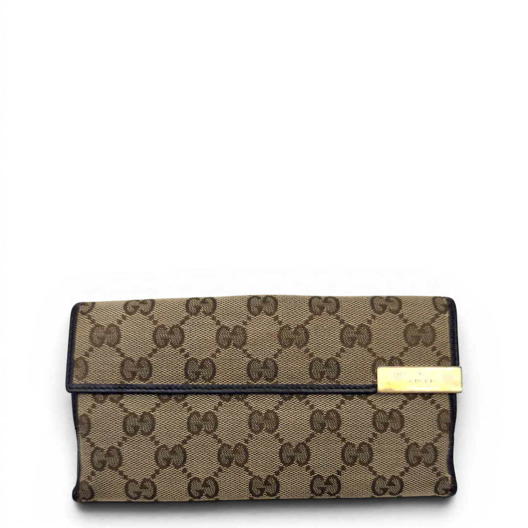 https://cdn.shopify.com/s/files/1/0564/9376/8855/files/Gucci_Geldbeutel_Bifold_monogram_beige_1.webp?v=1783512890