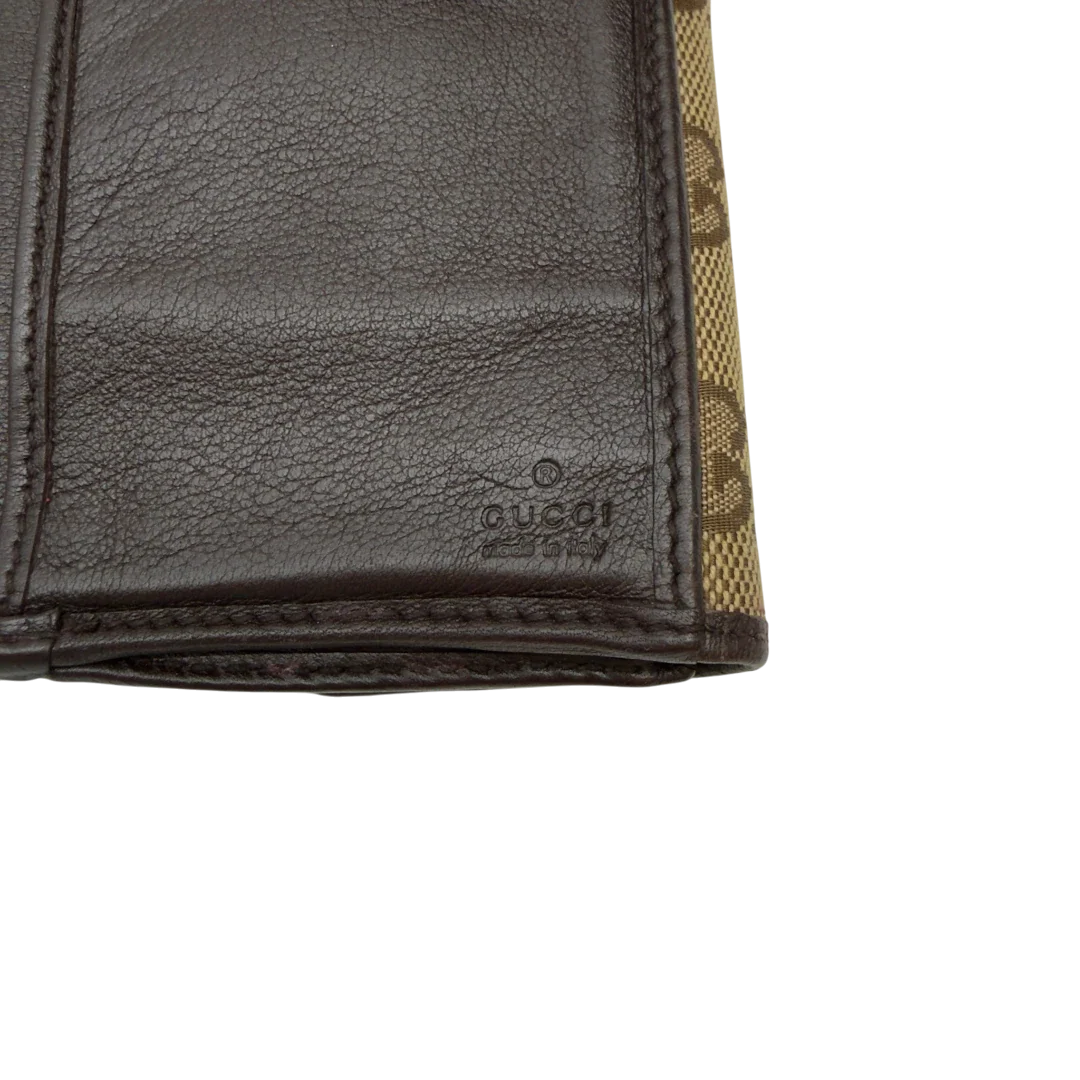 https://cdn.shopify.com/s/files/1/0564/9376/8855/files/Gucci_Geldbeutel_Bifold_monogram_beige_12.webp?v=1783512889