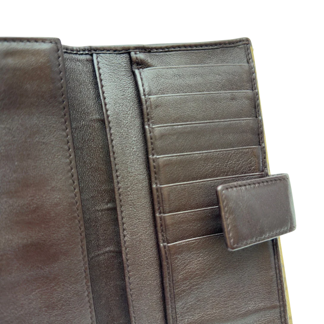 https://cdn.shopify.com/s/files/1/0564/9376/8855/files/Gucci_Geldbeutel_Bifold_monogram_beige_13.webp?v=1783512890