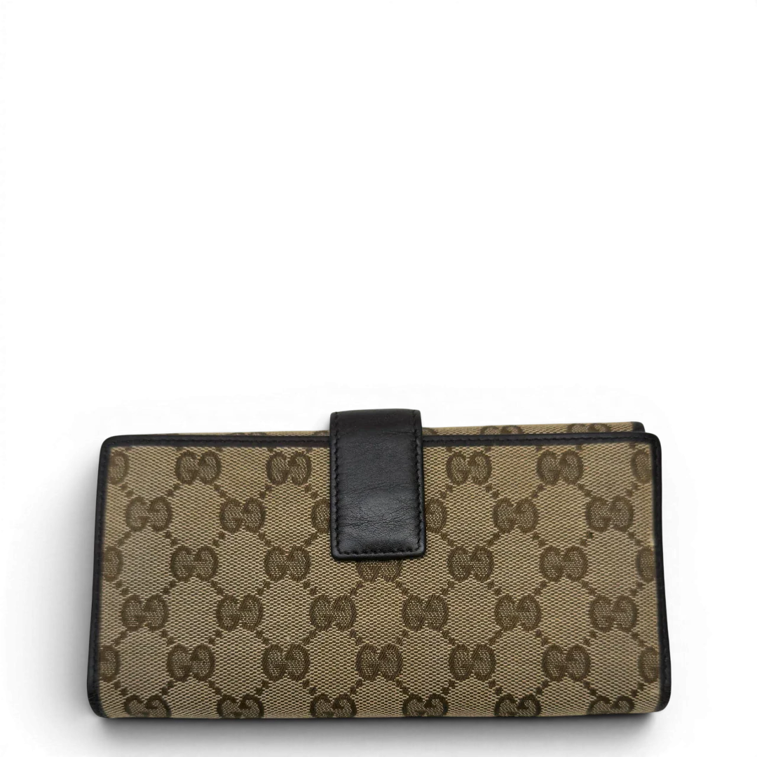 https://cdn.shopify.com/s/files/1/0564/9376/8855/files/Gucci_Geldbeutel_Bifold_monogram_beige_2.webp?v=1783512889