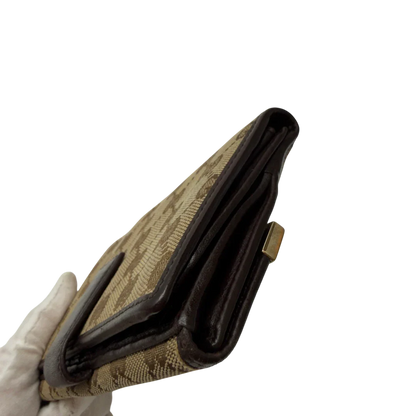 https://cdn.shopify.com/s/files/1/0564/9376/8855/files/Gucci_Geldbeutel_Bifold_monogram_beige_4.webp?v=1783512889