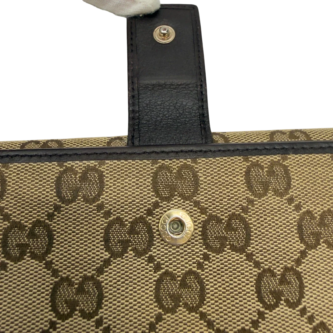 https://cdn.shopify.com/s/files/1/0564/9376/8855/files/Gucci_Geldbeutel_Bifold_monogram_beige_5.webp?v=1783512890
