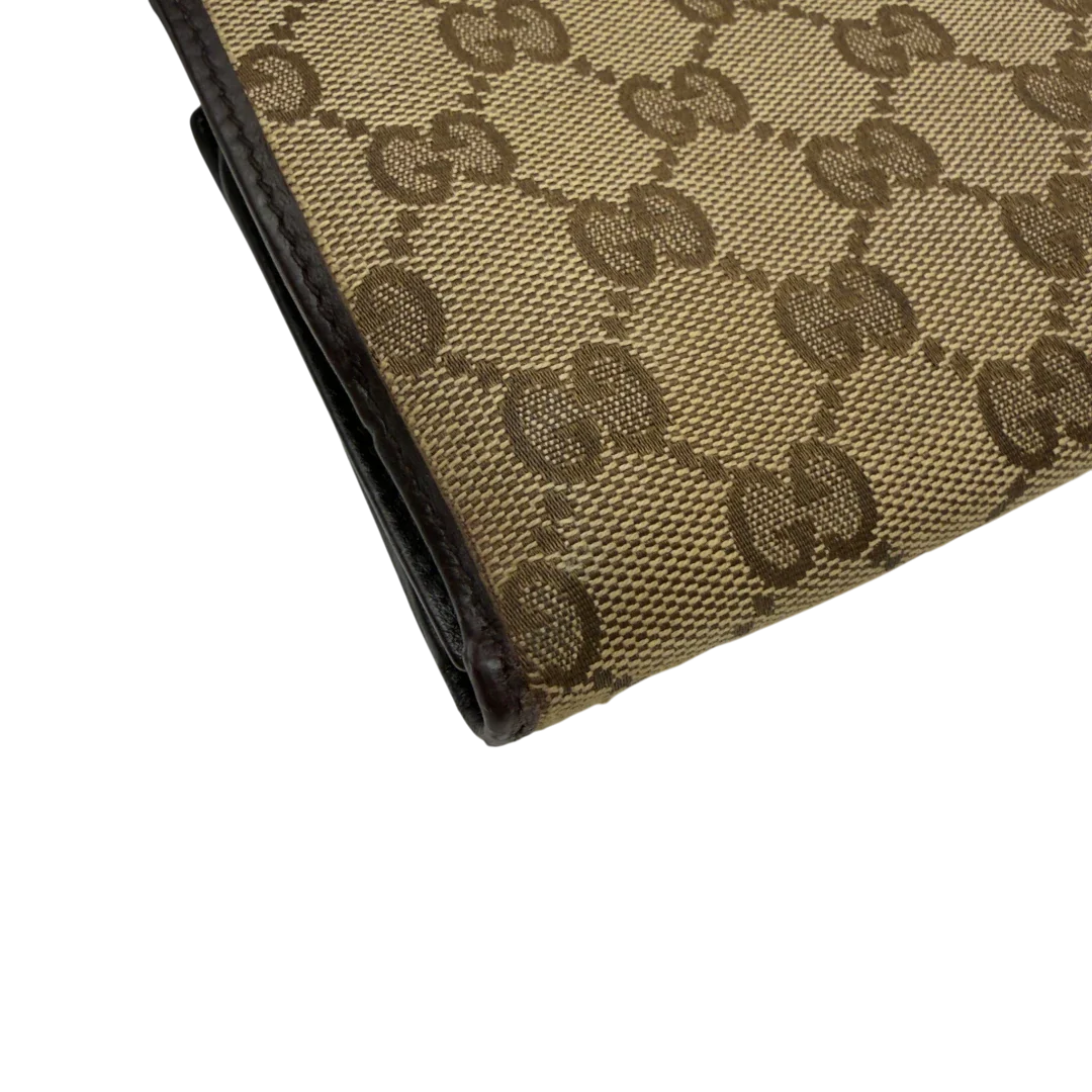 https://cdn.shopify.com/s/files/1/0564/9376/8855/files/Gucci_Geldbeutel_Bifold_monogram_beige_7.webp?v=1783512890