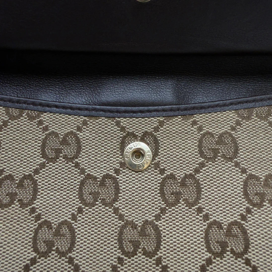 https://cdn.shopify.com/s/files/1/0564/9376/8855/files/Gucci_Geldbeutel_Bifold_monogram_beige_9.webp?v=1783512890