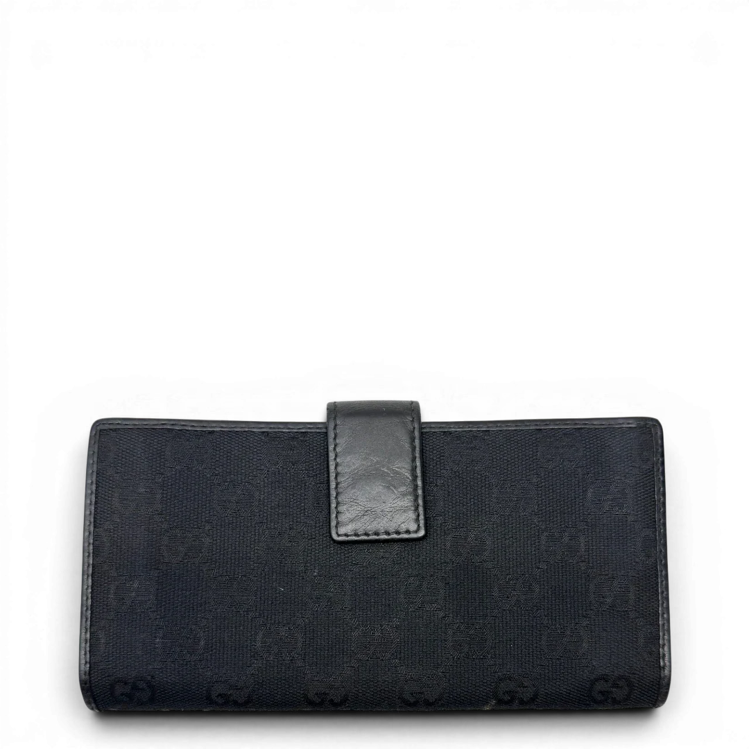 https://cdn.shopify.com/s/files/1/0564/9376/8855/files/Gucci_Geldbeutel_Bifold_monogram_schwarz_3.webp?v=1783512949