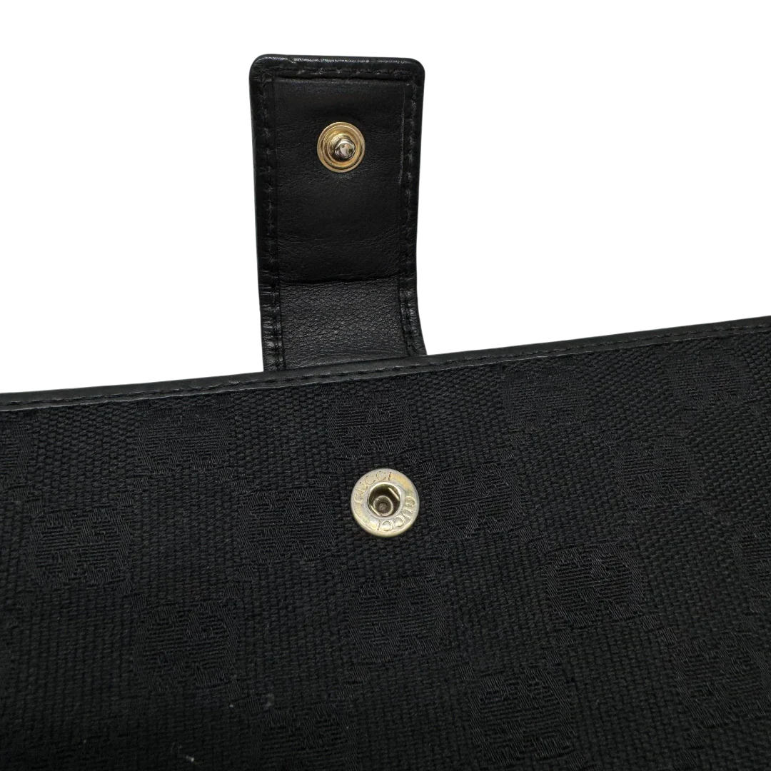 https://cdn.shopify.com/s/files/1/0564/9376/8855/files/Gucci_Geldbeutel_Bifold_monogram_schwarz_7.webp?v=1783512949