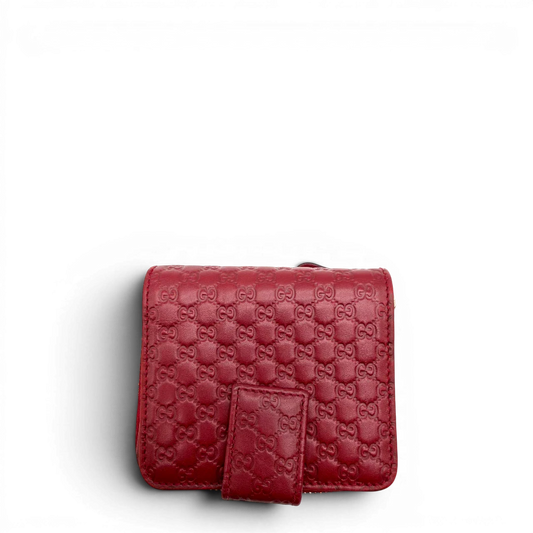 https://cdn.shopify.com/s/files/1/0564/9376/8855/files/Gucci_Geldbeutel_Compact_Micro_Guccissima_aus_Leder_rot_vintage_GG8178.webp?v=1781084474