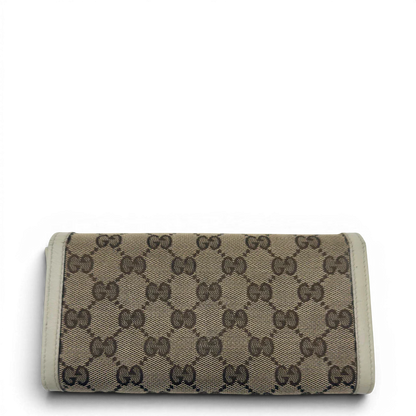 https://cdn.shopify.com/s/files/1/0564/9376/8855/files/Gucci_Geldbeutel_GG_langlich_monogram_beige_2.webp?v=1783513044