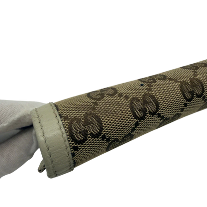 https://cdn.shopify.com/s/files/1/0564/9376/8855/files/Gucci_Geldbeutel_GG_langlich_monogram_beige_6.webp?v=1783513044