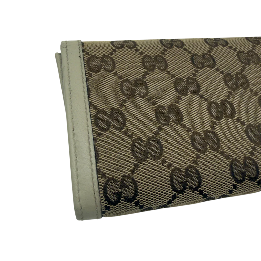 https://cdn.shopify.com/s/files/1/0564/9376/8855/files/Gucci_Geldbeutel_GG_langlich_monogram_beige_7.webp?v=1783513044