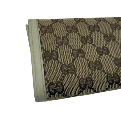 https://cdn.shopify.com/s/files/1/0564/9376/8855/files/Gucci_Geldbeutel_GG_langlich_monogram_beige_7.webp?v=1783513044