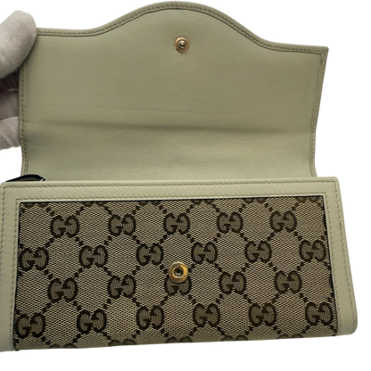 https://cdn.shopify.com/s/files/1/0564/9376/8855/files/Gucci_Geldbeutel_GG_langlich_monogram_beige_8.webp?v=1783513045