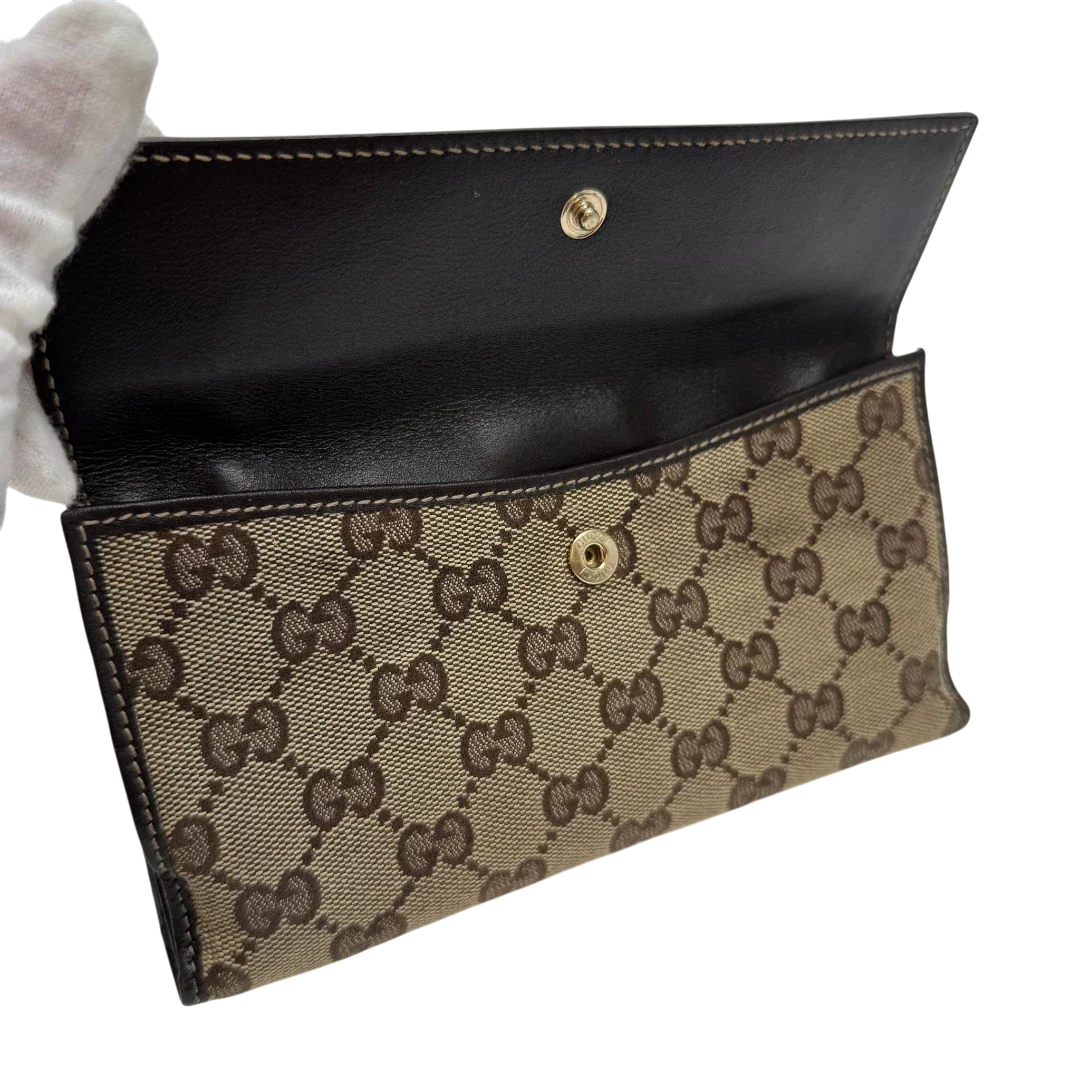 https://cdn.shopify.com/s/files/1/0564/9376/8855/files/Gucci_Geldbeutel_Heart_Continental_langlich_monogram_beige_6.webp?v=1783513751