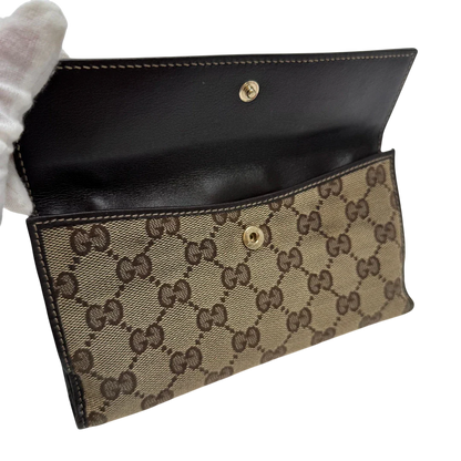 https://cdn.shopify.com/s/files/1/0564/9376/8855/files/Gucci_Geldbeutel_Heart_Continental_langlich_monogram_beige_6.webp?v=1783513751
