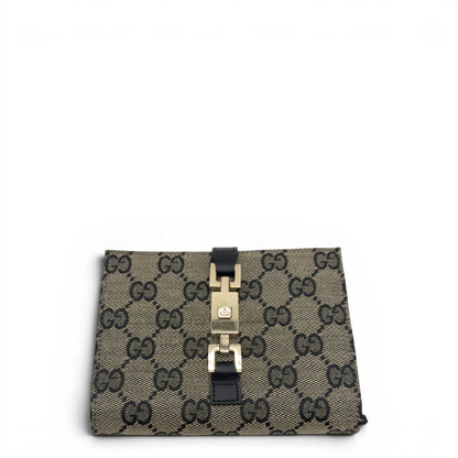 https://cdn.shopify.com/s/files/1/0564/9376/8855/files/Gucci_Geldbeutel_Jackie_monogram_beige_1.webp?v=1782385289