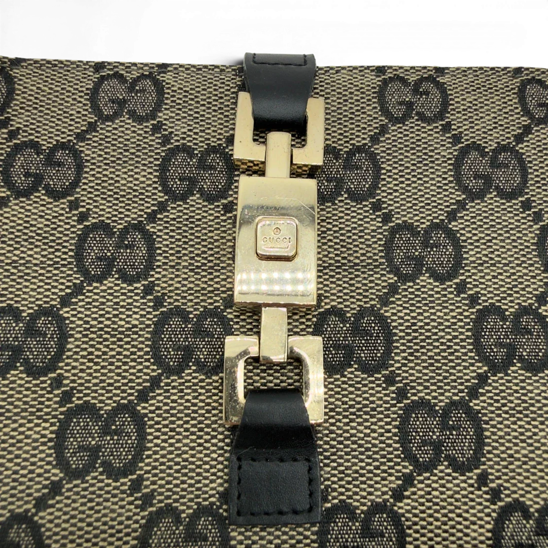 https://cdn.shopify.com/s/files/1/0564/9376/8855/files/Gucci_Geldbeutel_Jackie_monogram_beige_10.webp?v=1782385290