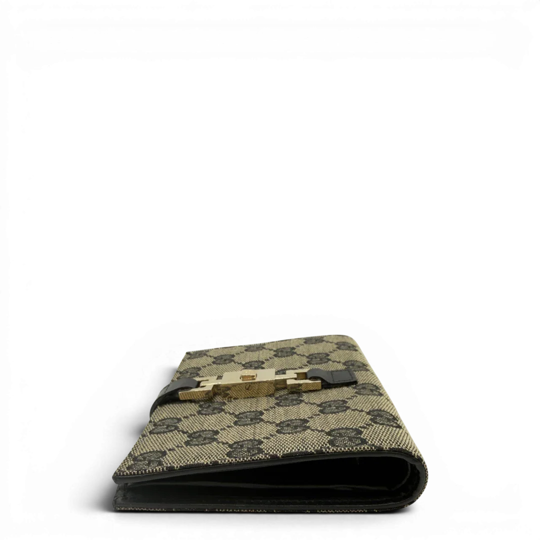 https://cdn.shopify.com/s/files/1/0564/9376/8855/files/Gucci_Geldbeutel_Jackie_monogram_beige_3.webp?v=1782385289