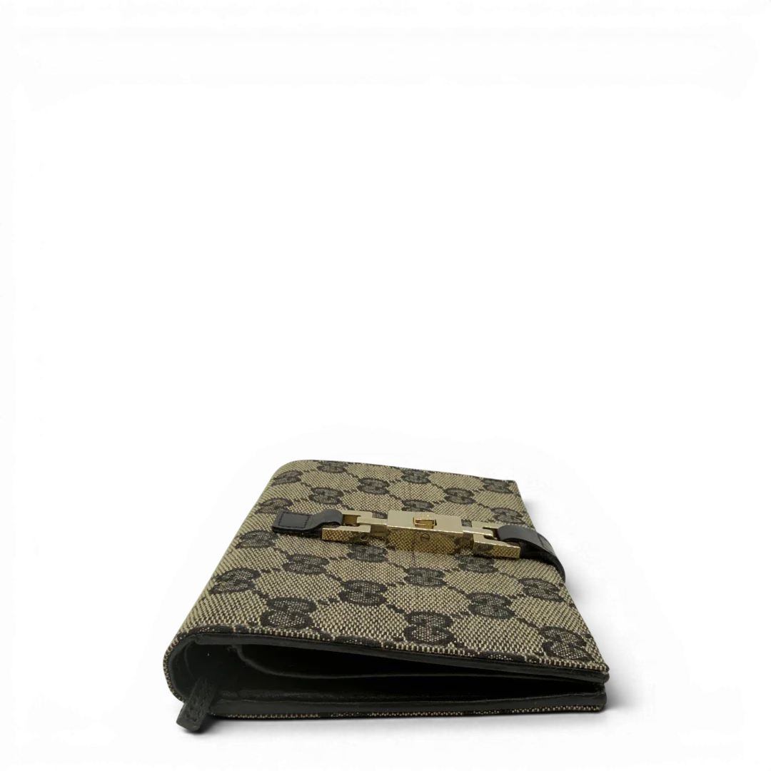 https://cdn.shopify.com/s/files/1/0564/9376/8855/files/Gucci_Geldbeutel_Jackie_monogram_beige_4.webp?v=1782385289