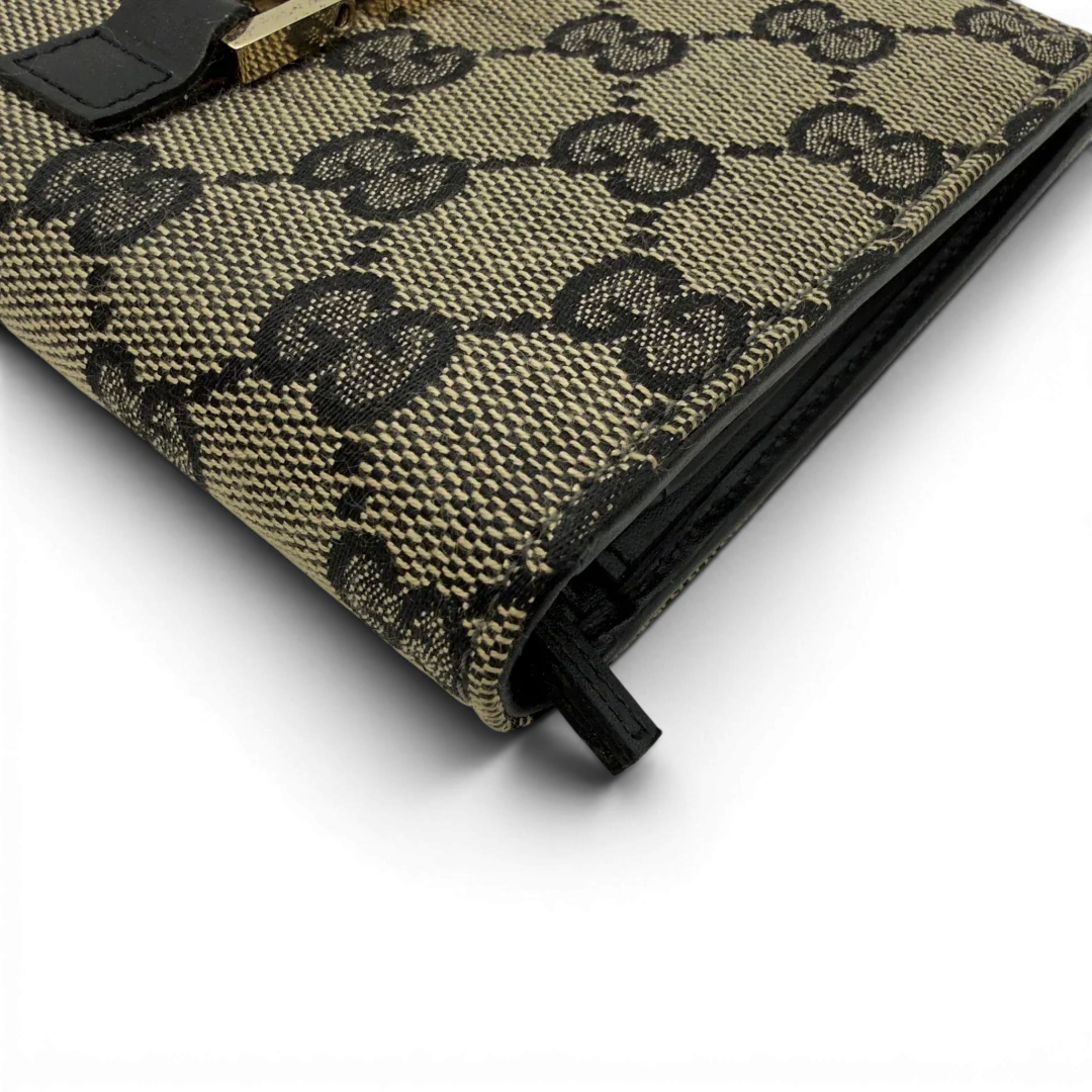 https://cdn.shopify.com/s/files/1/0564/9376/8855/files/Gucci_Geldbeutel_Jackie_monogram_beige_6.webp?v=1782385289