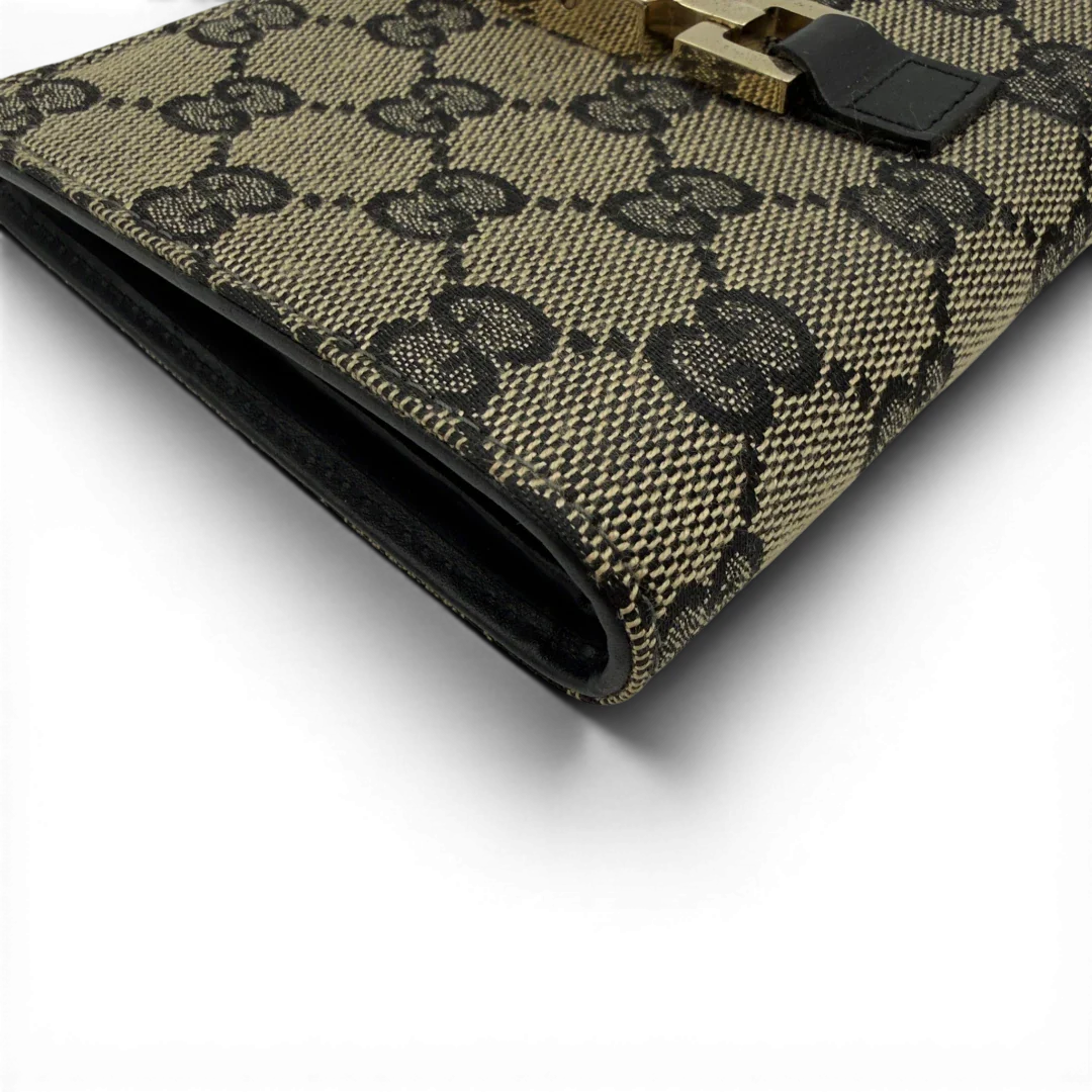 https://cdn.shopify.com/s/files/1/0564/9376/8855/files/Gucci_Geldbeutel_Jackie_monogram_beige_7.webp?v=1782385289