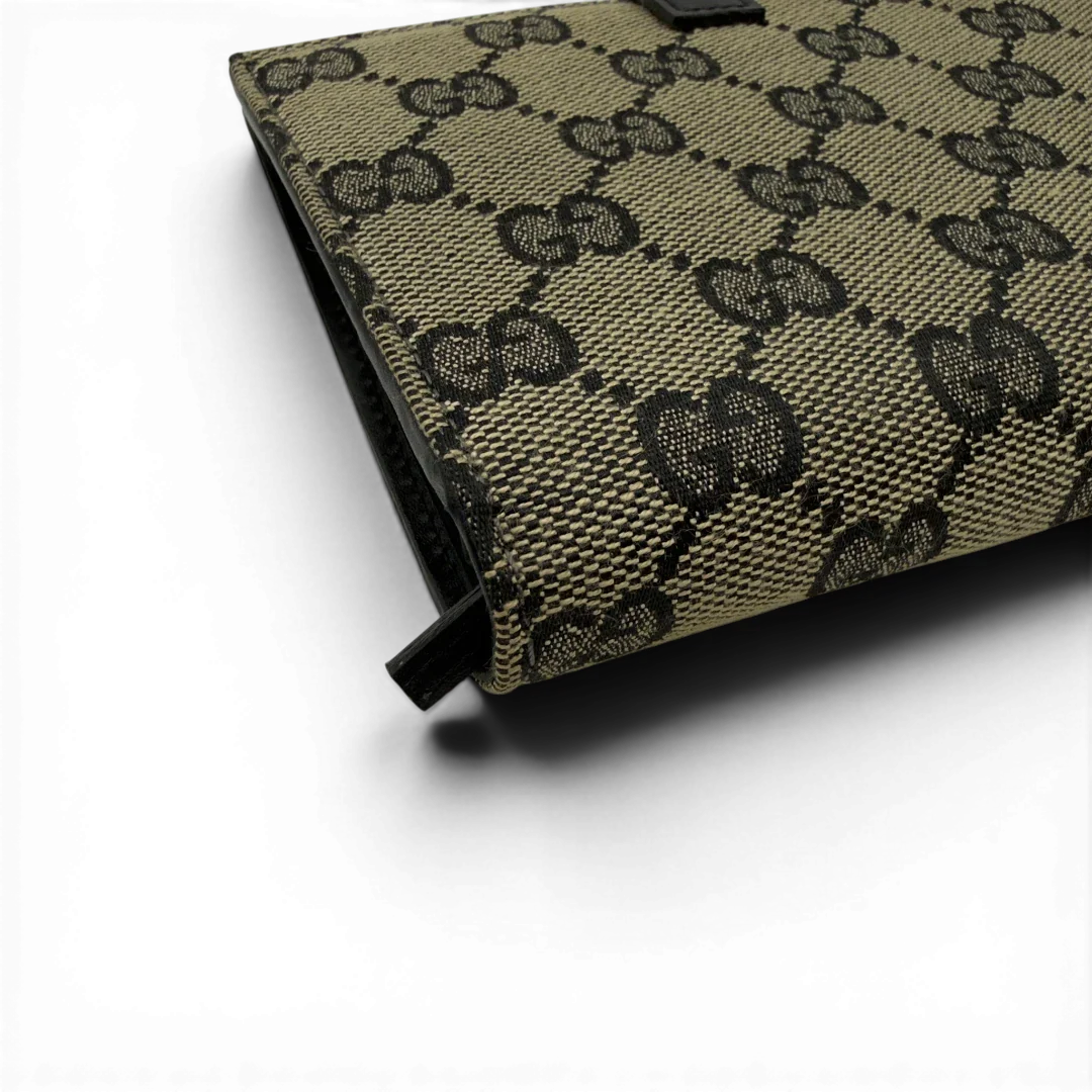 https://cdn.shopify.com/s/files/1/0564/9376/8855/files/Gucci_Geldbeutel_Jackie_monogram_beige_9.webp?v=1782385289
