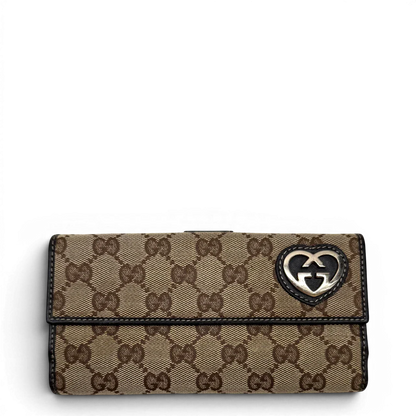 https://cdn.shopify.com/s/files/1/0564/9376/8855/files/Gucci_Geldbeutel_Lovely_Heart_langlich_monogram_beige_1.webp?v=1783513516