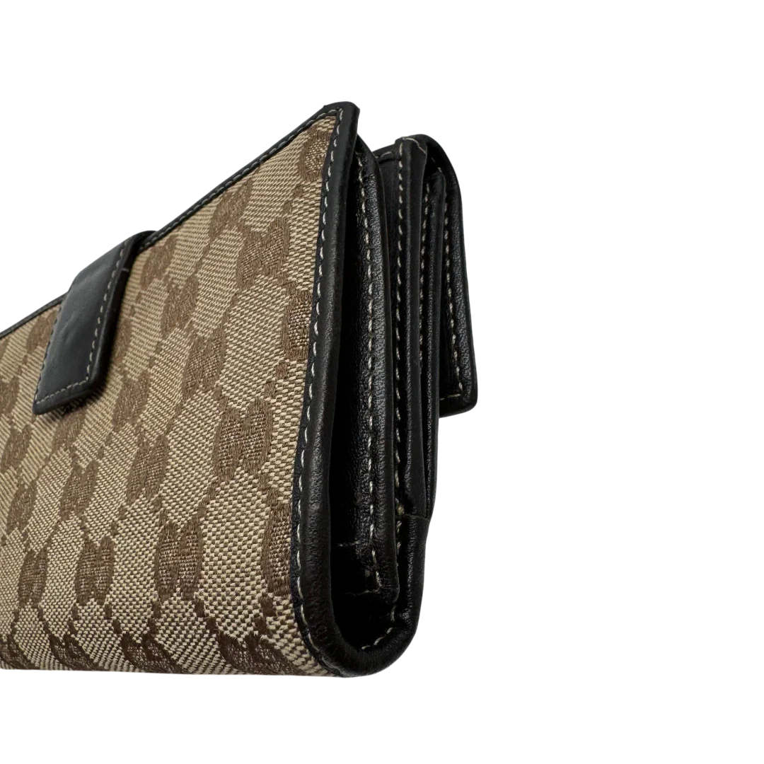 https://cdn.shopify.com/s/files/1/0564/9376/8855/files/Gucci_Geldbeutel_Lovely_Heart_langlich_monogram_beige_3.webp?v=1783513516