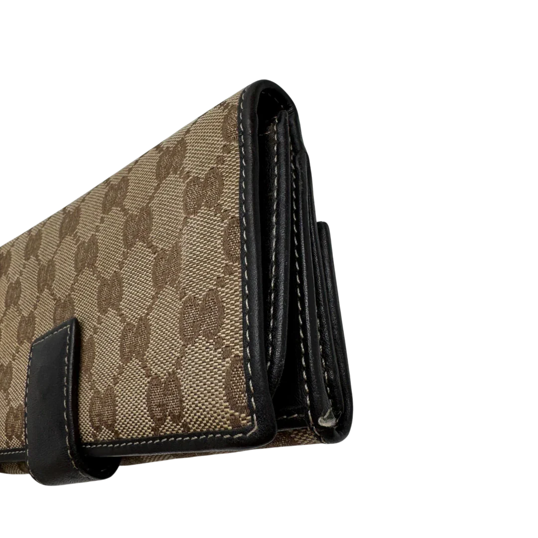 https://cdn.shopify.com/s/files/1/0564/9376/8855/files/Gucci_Geldbeutel_Lovely_Heart_langlich_monogram_beige_4.webp?v=1783513516
