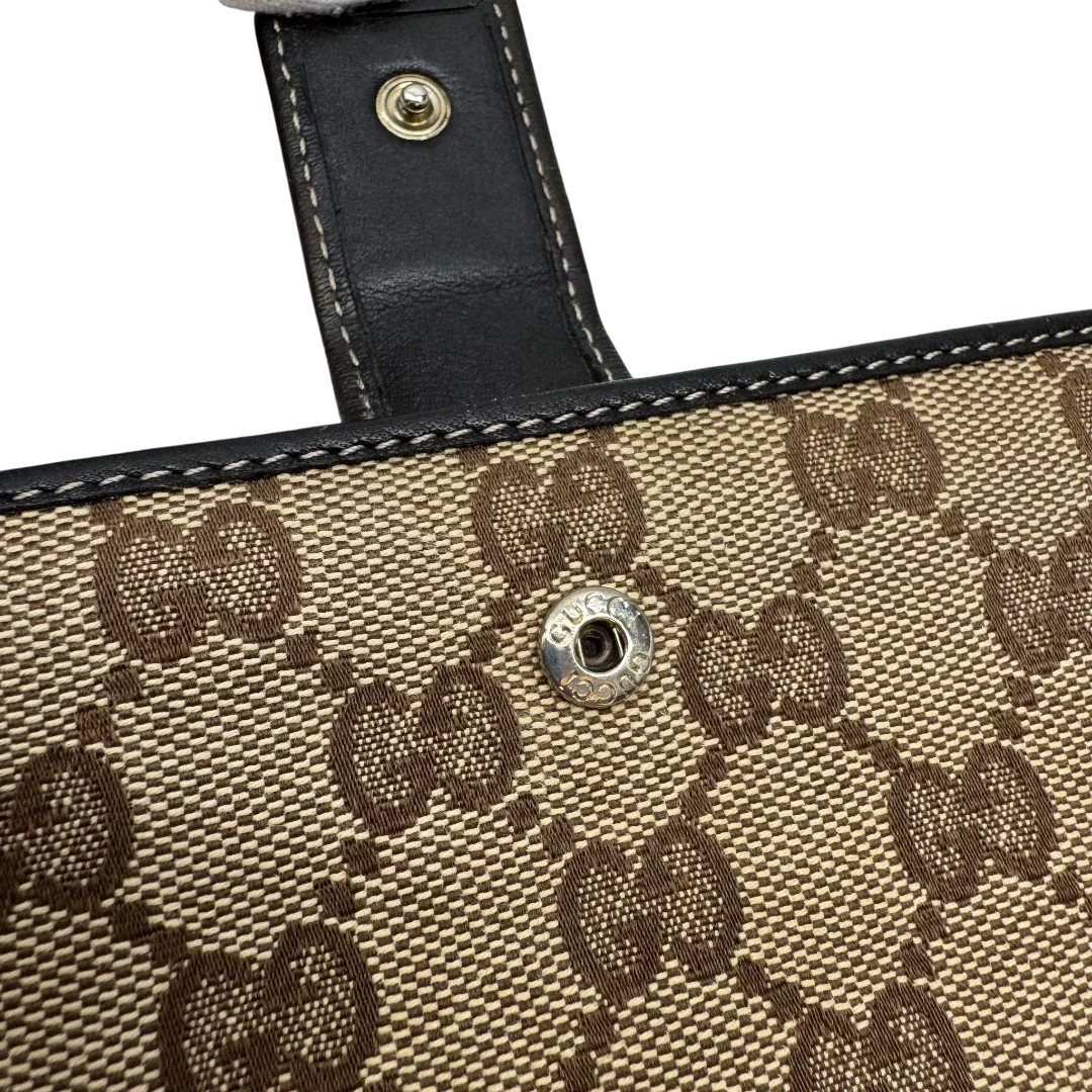 https://cdn.shopify.com/s/files/1/0564/9376/8855/files/Gucci_Geldbeutel_Lovely_Heart_langlich_monogram_beige_5.webp?v=1783513517