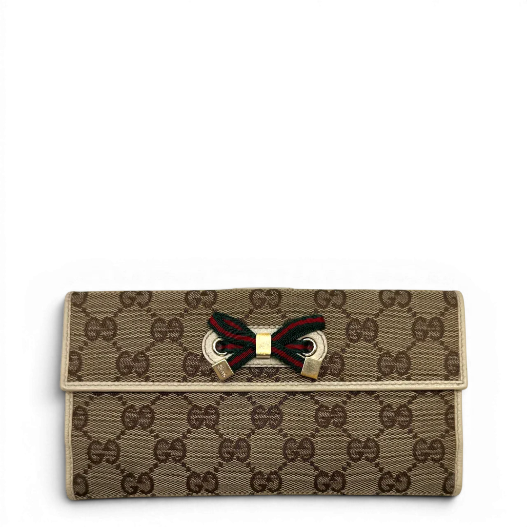 https://cdn.shopify.com/s/files/1/0564/9376/8855/files/Gucci_Geldbeutel_Princy_Continental_monogram_beige_1.webp?v=1783513453