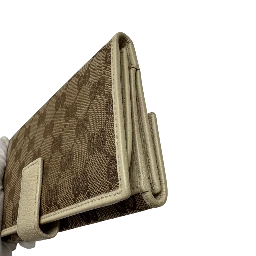https://cdn.shopify.com/s/files/1/0564/9376/8855/files/Gucci_Geldbeutel_Princy_Continental_monogram_beige_4.webp?v=1783513453