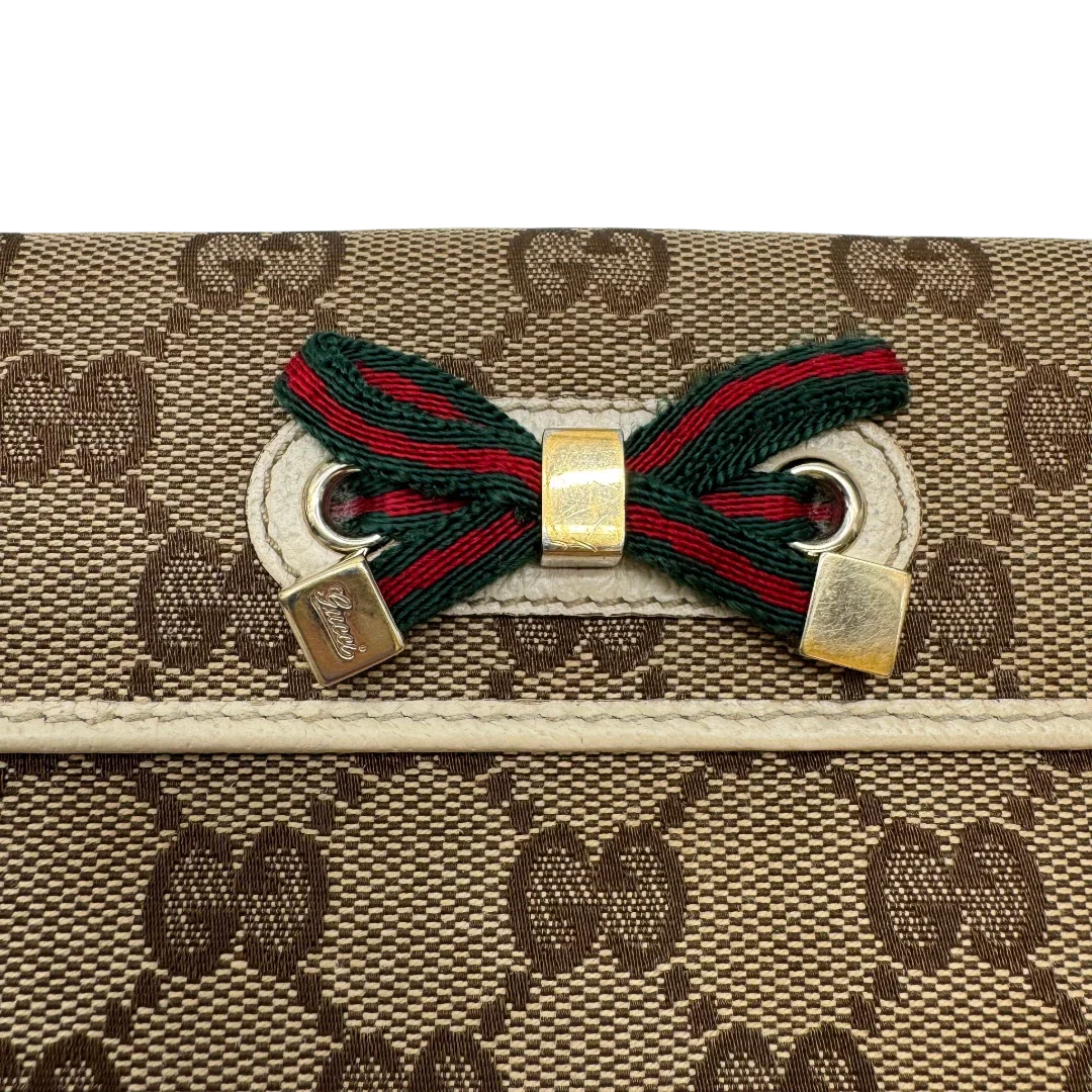 https://cdn.shopify.com/s/files/1/0564/9376/8855/files/Gucci_Geldbeutel_Princy_Continental_monogram_beige_5.webp?v=1783513454