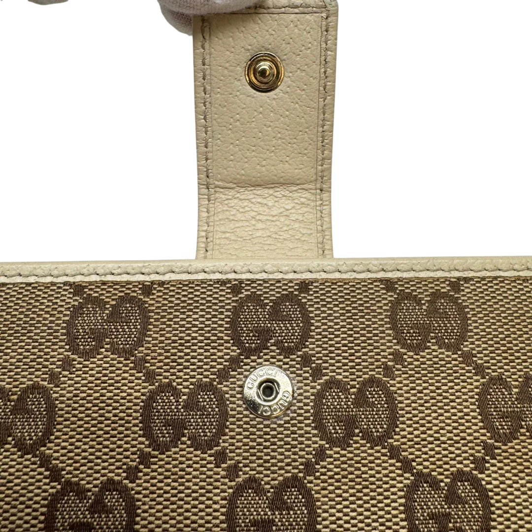 https://cdn.shopify.com/s/files/1/0564/9376/8855/files/Gucci_Geldbeutel_Princy_Continental_monogram_beige_6.webp?v=1783513454