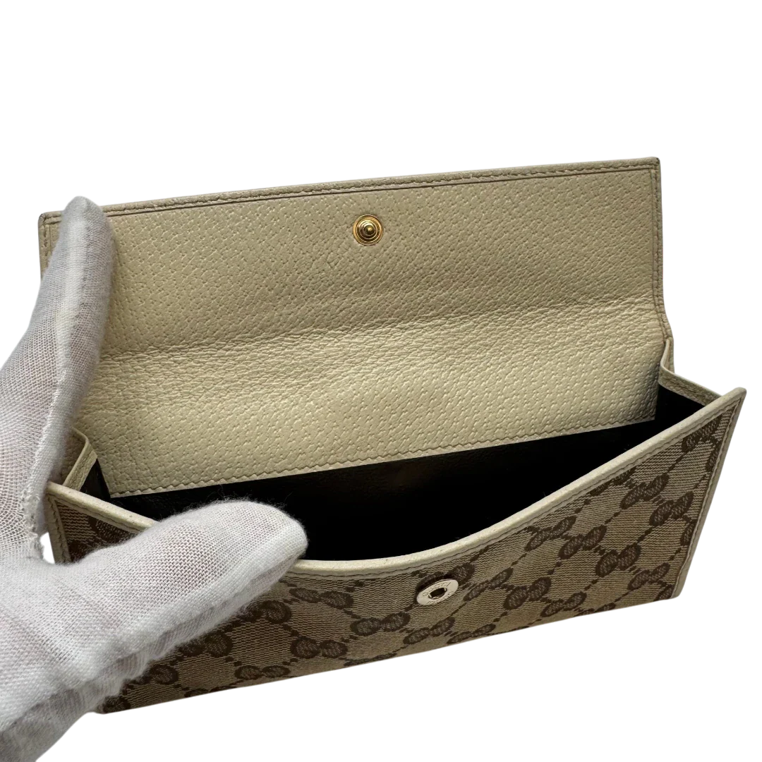https://cdn.shopify.com/s/files/1/0564/9376/8855/files/Gucci_Geldbeutel_Princy_Continental_monogram_beige_7.webp?v=1783513454