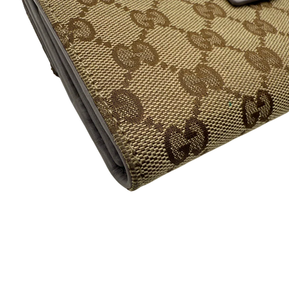 https://cdn.shopify.com/s/files/1/0564/9376/8855/files/Gucci_Geldbeutel_langlich_Trifold_monogram_beige_vintage_GG4065.webp?v=1775733032