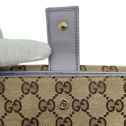 https://cdn.shopify.com/s/files/1/0564/9376/8855/files/Gucci_Geldbeutel_langlich_Trifold_monogram_beige_vintage_GG4074.webp?v=1775734429