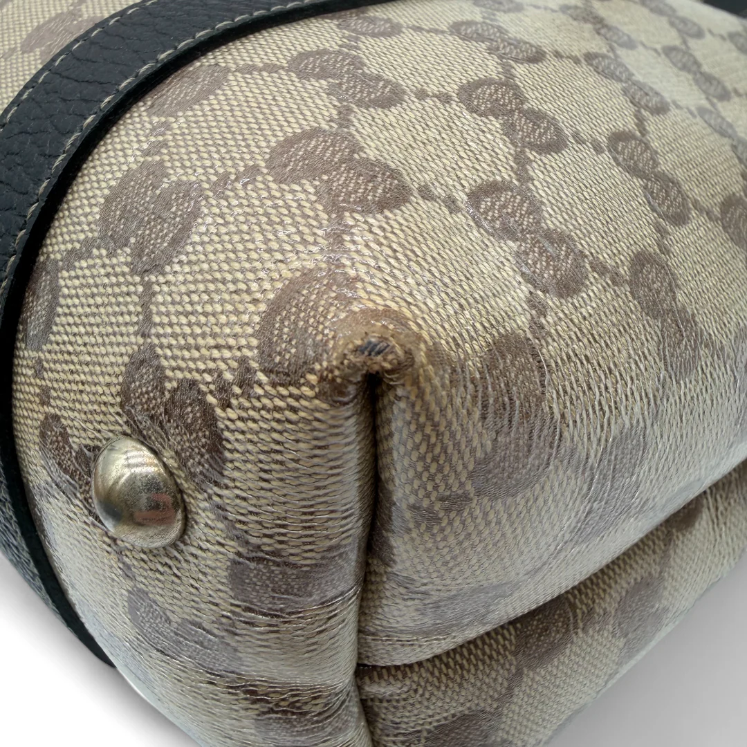 https://cdn.shopify.com/s/files/1/0564/9376/8855/files/Gucci_Handtasche_Abbey_PVC_monogram_beige_vintage_gg_handbag7985.webp?v=1759394852