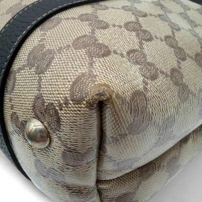 https://cdn.shopify.com/s/files/1/0564/9376/8855/files/Gucci_Handtasche_Abbey_PVC_monogram_beige_vintage_gg_handbag7985.webp?v=1759394852