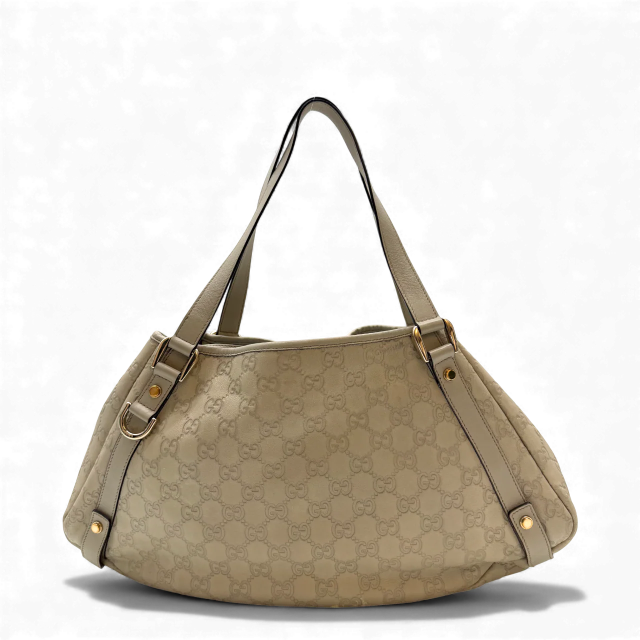 https://cdn.shopify.com/s/files/1/0564/9376/8855/files/Gucci_Handtasche_Abbey_Shopper_aus_Leder_monogram_beige_vintage_GG3572.webp?v=1764858737