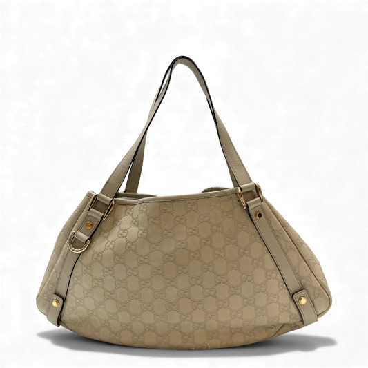 https://cdn.shopify.com/s/files/1/0564/9376/8855/files/Gucci_Handtasche_Abbey_Shopper_aus_Leder_monogram_beige_vintage_GG3572.webp?v=1764858737