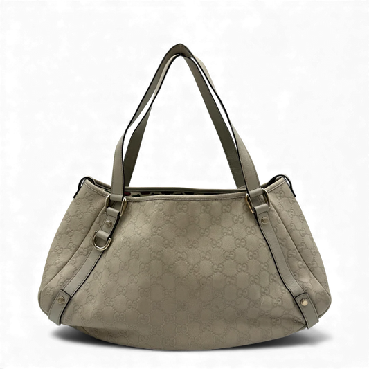 https://cdn.shopify.com/s/files/1/0564/9376/8855/files/Gucci_Handtasche_Abbey_Shopper_aus_Leder_monogram_beige_vintage_GG_handbag3894.webp?v=1764295744