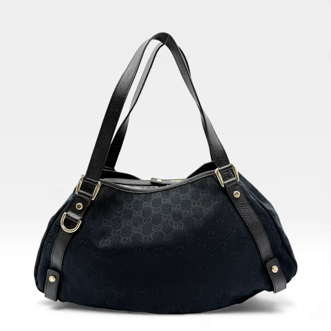 https://cdn.shopify.com/s/files/1/0564/9376/8855/files/Gucci_Handtasche_Abbey_Shopper_monogram_schwarz_vintage_GG4506.webp?v=1764895697