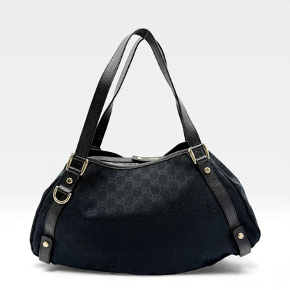 https://cdn.shopify.com/s/files/1/0564/9376/8855/files/Gucci_Handtasche_Abbey_Shopper_monogram_schwarz_vintage_GG4506.webp?v=1764895697