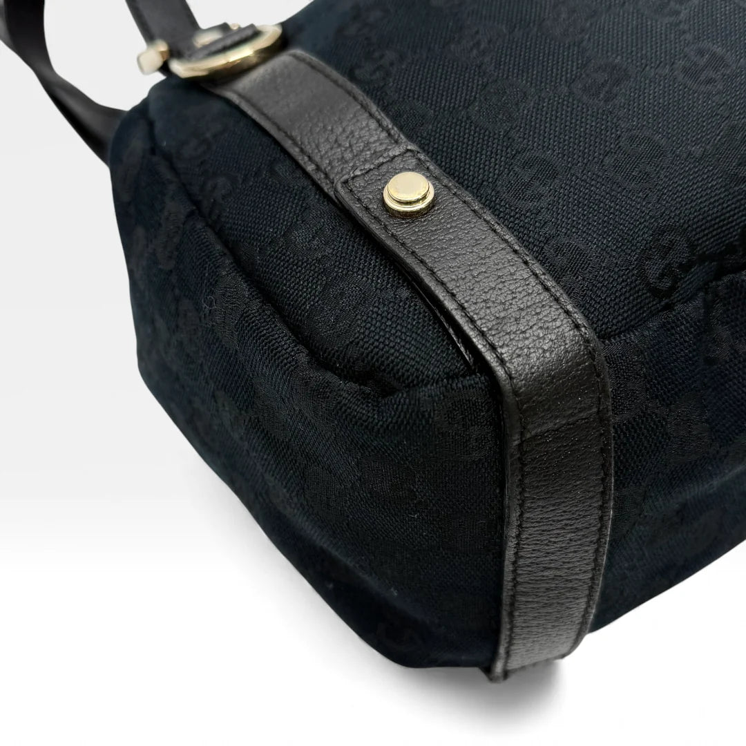 https://cdn.shopify.com/s/files/1/0564/9376/8855/files/Gucci_Handtasche_Abbey_Shopper_monogram_schwarz_vintage_GG4515.webp?v=1764895697