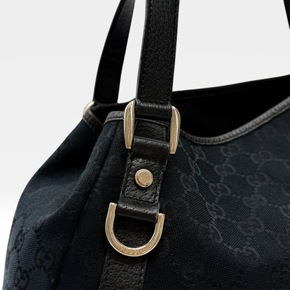https://cdn.shopify.com/s/files/1/0564/9376/8855/files/Gucci_Handtasche_Abbey_Shopper_monogram_schwarz_vintage_GG4522.webp?v=1764895697
