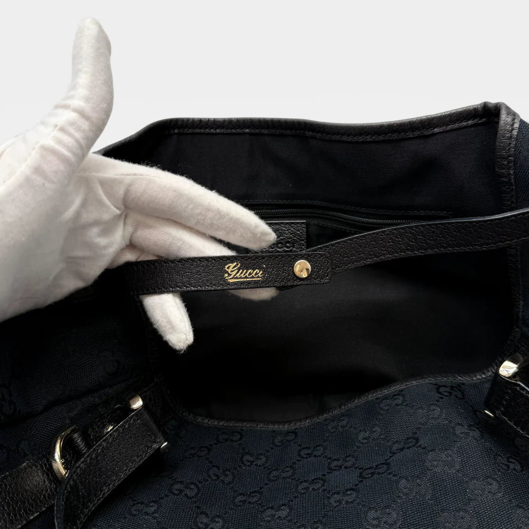 https://cdn.shopify.com/s/files/1/0564/9376/8855/files/Gucci_Handtasche_Abbey_Shopper_monogram_schwarz_vintage_GG4524.webp?v=1764895697