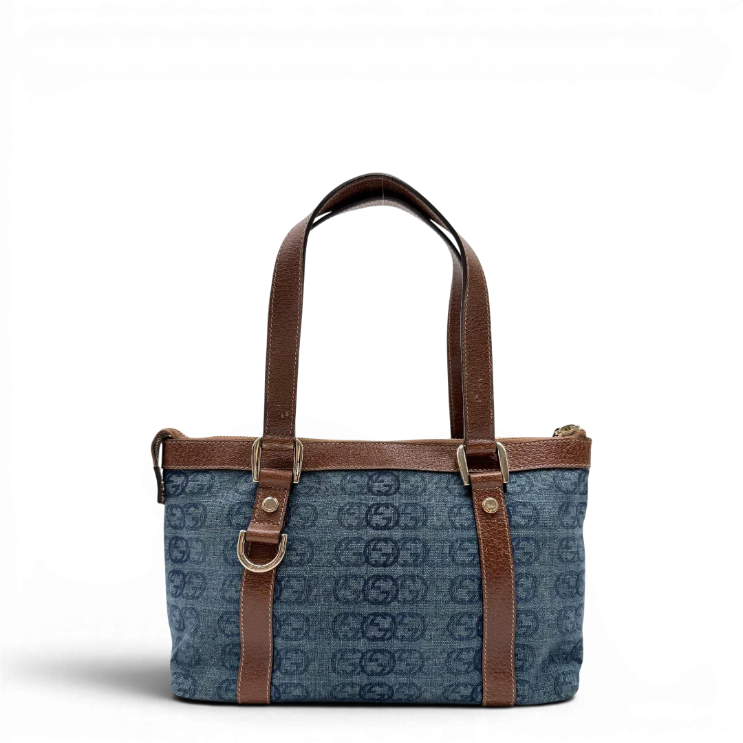https://cdn.shopify.com/s/files/1/0564/9376/8855/files/Gucci_Handtasche_Abbey_klein_Denim_monogram_blau_vintage_GG7866.webp?v=1780489845