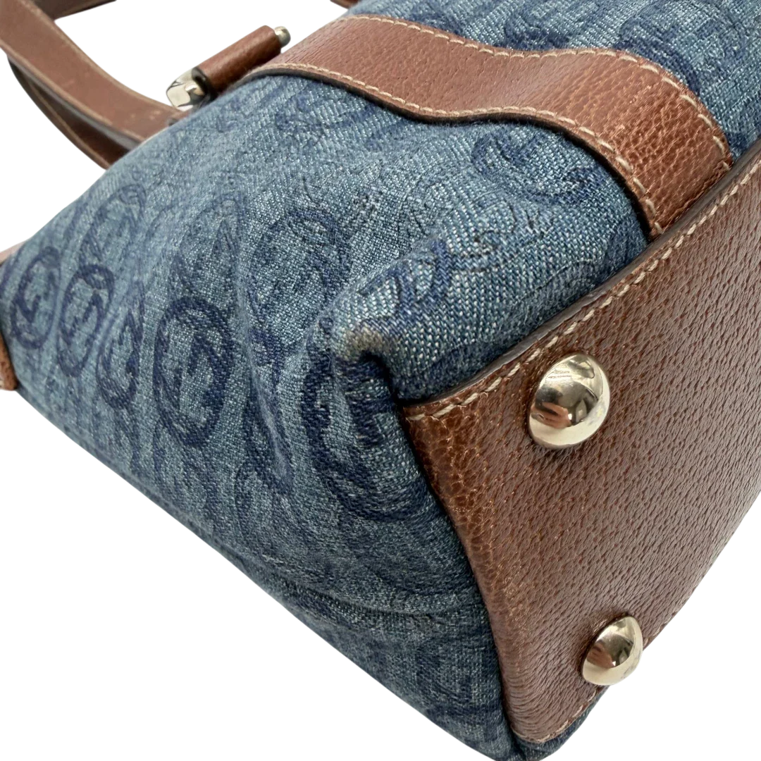 https://cdn.shopify.com/s/files/1/0564/9376/8855/files/Gucci_Handtasche_Abbey_klein_Denim_monogram_blau_vintage_GG7874.webp?v=1780489846