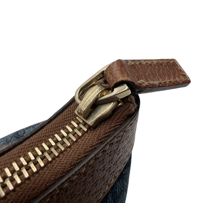 https://cdn.shopify.com/s/files/1/0564/9376/8855/files/Gucci_Handtasche_Abbey_klein_Denim_monogram_blau_vintage_GG7878.webp?v=1780489845